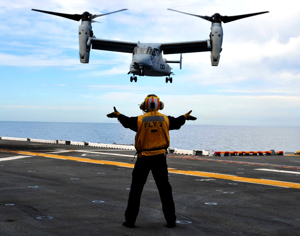 Defense.gov News Photo 110301-N-KD852-038 - An MV-22 Osprey tiltrotor aircraft attached to Marine Medium Tiltrotor Squadron 166 approaches the flight deck of the amphibious assault ship USS