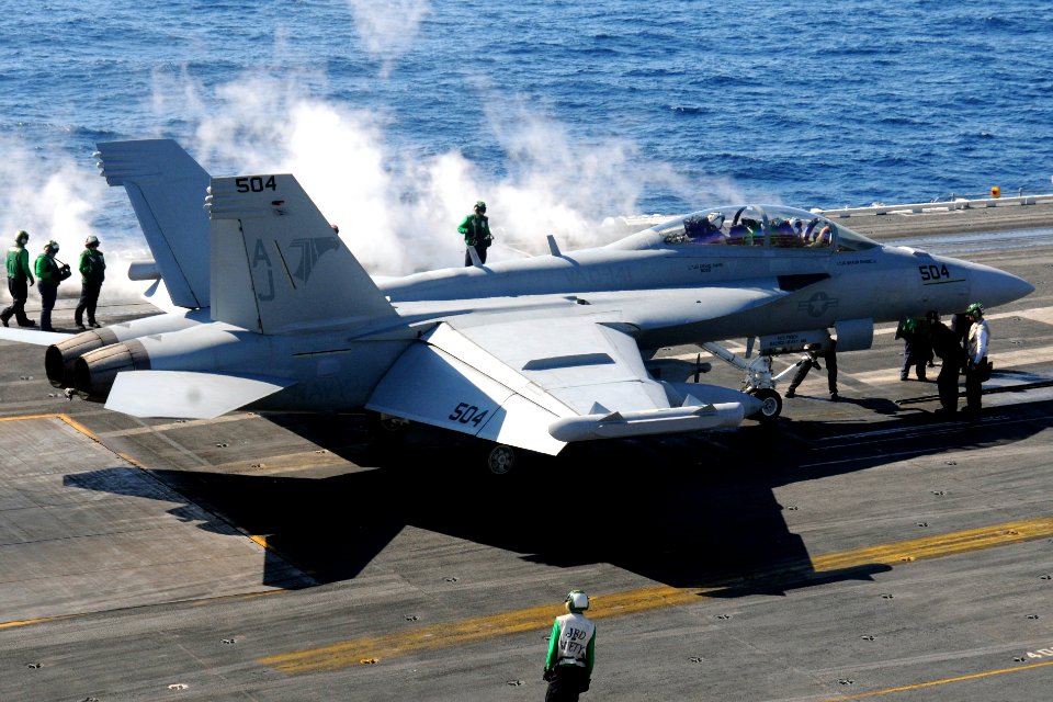 Defense.gov News Photo 110129-N-7004H-071 - An EA-18G Growler assigned to Electronic Attack Squadron 141 prepares to take off from the aircraft carrier USS George H.W. Bush CVN 77 . The