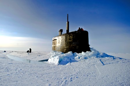 Defense.gov News Photo 110319-N-UH963-293 - U.S. Navy sailors and members of the Applied Physics Laboratory Ice Station clear ice from the hatch of the USS Connecticut SSN 22 as it surfaces photo