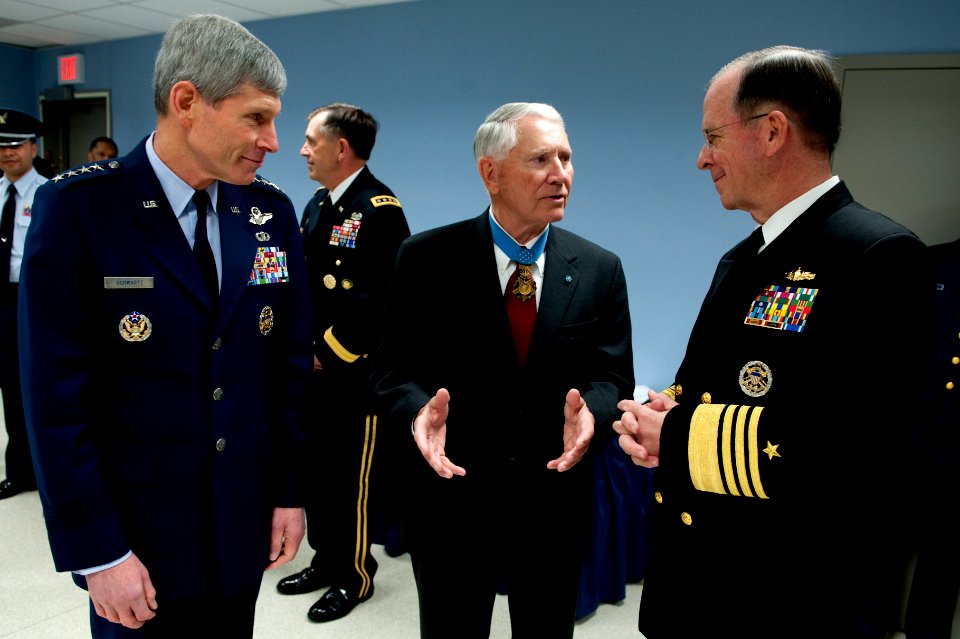 Defense.gov News Photo 110325-N-TT977-107 - President of the Congressional Medal of Honor Society retired U.S. Air Force Col. Leo K. Thosness speaks with Air Force Chief of Staff Gen. Norton