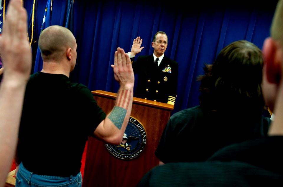 Defense.gov News Photo 110404-N-TT977-209 - Chairman of the Joint Chiefs of Staff Adm. Mike Mullen U.S. Navy enlists eight new service members at the Boise Idaho Military Entrance