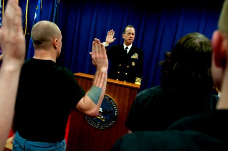 Defense.gov News Photo 110404-N-TT977-209 - Chairman of the Joint Chiefs of Staff Adm. Mike Mullen U.S. Navy enlists eight new service members at the Boise Idaho Military Entrance