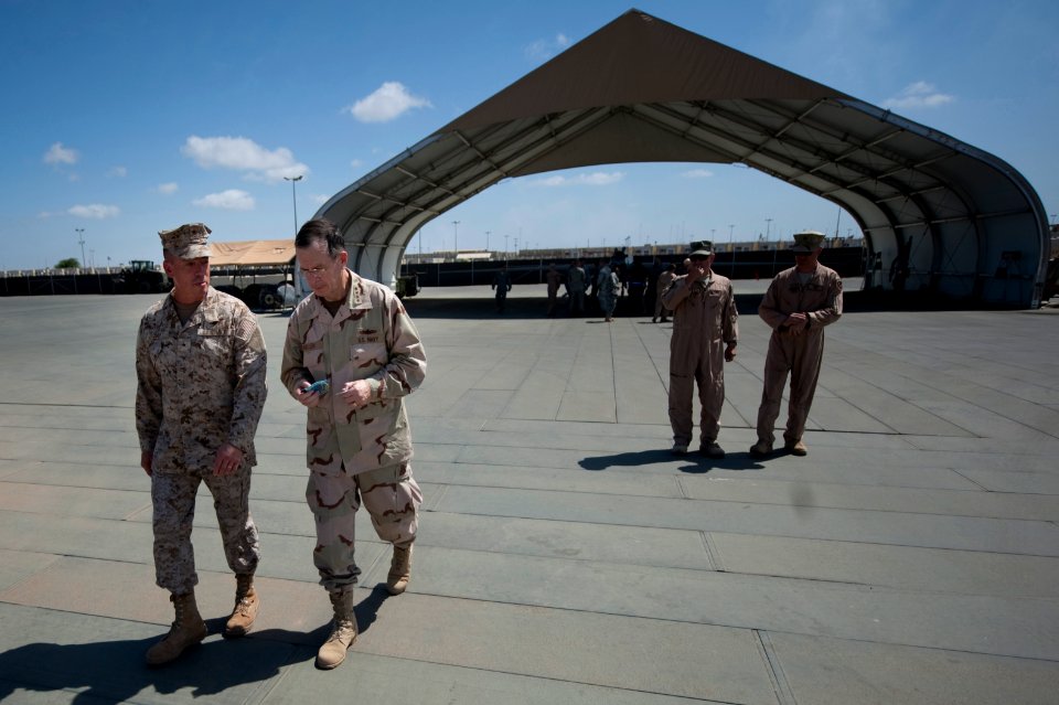 Defense.gov News Photo 110224-N-TT977-457 - Chairman of the Joint Chiefs of Staff Adm. Mike Mullen U.S. Navy speaks with Commander of Joint Task Force Horn of Africa Rear Adm. Brian L