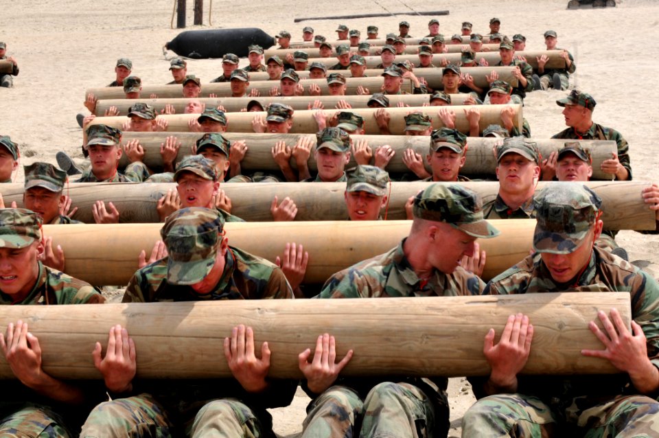 Defense.gov News Photo 110406-N-YS896-131 - First Phase Basic Underwater Demolition SEALs BUD S candidates use teamwork to perform physical training exercises with a 600 pound log at Naval