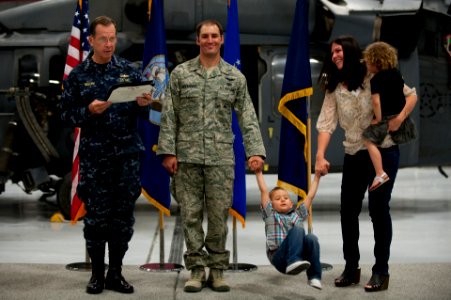 Defense.gov News Photo 110413-N-TT977-089 - Chairman of the Joint Chiefs of Staff Adm. Mike Mullen U.S. Navy reads the citation for the presentation of the Bronze Star to Air Force Staff Sgt