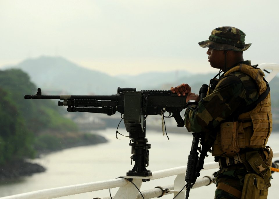 Defense.gov News Photo 110426-N-NY820-411 - U.S. Navy Petty Officer 3rd Class Jerris Bradley stands watch aboard the hospital ship USNS Comfort T-AH 20 as the ship transits the Panama Canal
