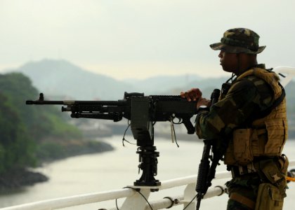 Defense.gov News Photo 110426-N-NY820-411 - U.S. Navy Petty Officer 3rd Class Jerris Bradley stands watch aboard the hospital ship USNS Comfort T-AH 20 as the ship transits the Panama Canal