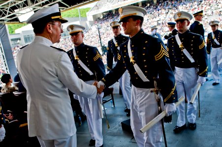 Defense.gov News Photo 110521-N-TT977-393 - Chairman of the Joint Chiefs of Staff Adm. Mike Mullen U.S. Navy congratulates cadets during commencement ceremonies at the U.S. Military Academy
