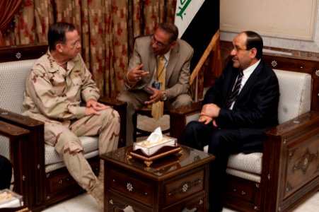 Defense.gov News Photo 110421-N-TT977-194 - Chairman of the Joint Chiefs of Staff Adm. Mike Mullen meets with Iraqi Prime Minister Nouri al-Maliki in Baghdad Iraq on April 21 2011. Mullen