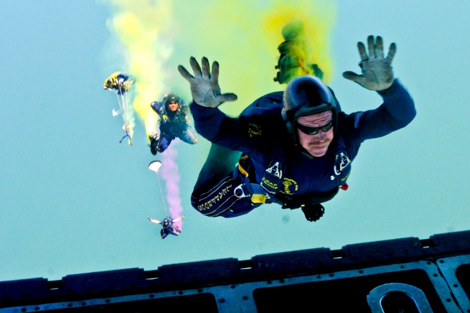 Defense.gov News Photo 110702-N-OU681-105 - U.S. Navy Chief Petty Officer Larry Summerfield assigned to the Navy parachute demonstration team the Leap Frogs jumps from a C-130 cargo
