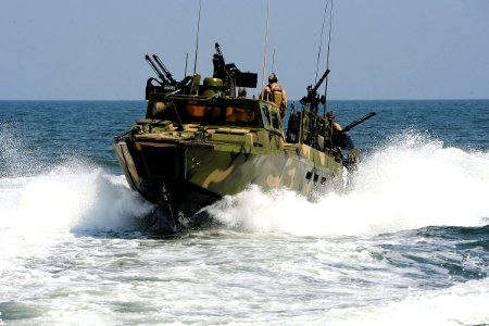 Defense.gov News Photo 110713-N-CD297-041 - Sailors assigned to Riverine Squadron 2 participate in pre-deployment exercises in a riverine command boat near Norfolk Va. on July 12 2011