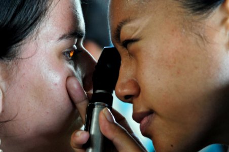 Defense.gov News Photo 110706-N-VV618-026 - U.S. Navy optometrist Lt. Patricia Salazar right looks into a patient s eye at the Los Angeles medical site in Puerto San Jose Guatemala during photo