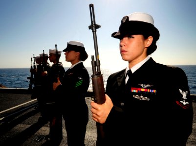 Defense.gov News Photo 110801-N-ZZ999-145 - Petty Officer 3rd Class Alexis Johnson serves as a member of the rifle guard aboard the aircraft carrier USS John C. Stennis CVN 74 during a burial