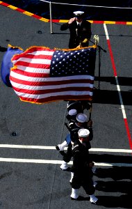 Defense.gov News Photo 110801-N-XM900-206 - Members of the color guard aboard the aircraft carrier USS John C. Stennis CVN 74 parade the colors during a burial at sea while underway in the