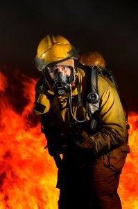 Defense.gov News Photo 110708-N-WP746-073 - U.S. Navy Petty Officer 1st Class Hector Floresdiaz demonstrates firefighting techniques to students attending the Center for Naval Engineering