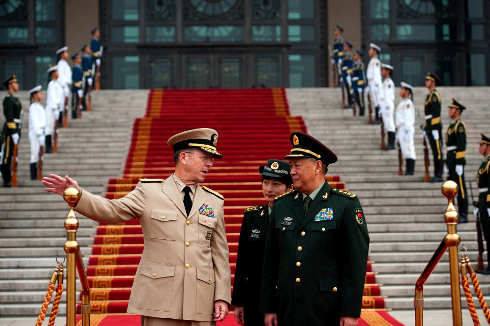 Defense.gov News Photo 110711-N-TT977-034 - Chairman of the Joint Chiefs of Staff Adm. Mike Mullen speaks with Chief of the Peoples Liberation Army s General Staff Gen. Chen Bingde during a