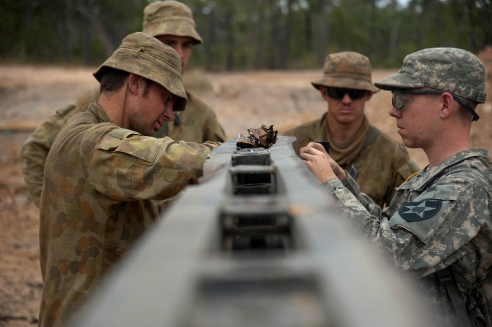 Defense.gov News Photo 110715-N-KG738-238 - U.S. Army soldiers from the 38th Engineer Company 4th Stryker Brigade 2nd Infantry Division and sappers from Australia s 2nd Troop 1st Field