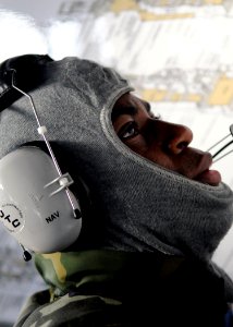 Defense.gov News Photo 110716-N-KB052-008 - Seaman Christian McGhee plots the locations and status of simulated shipboard casualties from the pilothouse during a total ship survivability