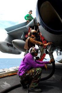 Defense.gov News Photo 110811-N-AW206-041 - Airman Raymond Burrell and Airman Thomas Robertson fuel an EA-6B Prowler assigned to Electronic Attack Squadron 136 aboard the nuclear-powered