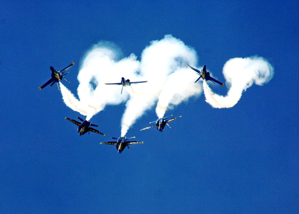 Defense.gov News Photo 110911-N-IR859-035 - The U.S. Navy Flight Demonstration Squadron the Blue Angels perform the Loop Break Cross maneuver at the Guardians of Freedom Air Show in Lincoln