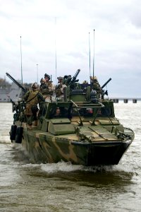Defense.gov News Photo 111207-N-PC102-143 - U.S. Marines with Riverine Squadron 1 conduct patrol and interdiction operations aboard Riverine Command Boat 804 off the coast of Newport News
