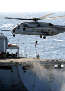 Defense.gov News Photo 111204-N-QM601-387 - Marines from the Force Reconnaissance Platoon for the 24th Marine Expeditionary Unit fast rope out of an CH-53 Super Stallion assigned to Marine