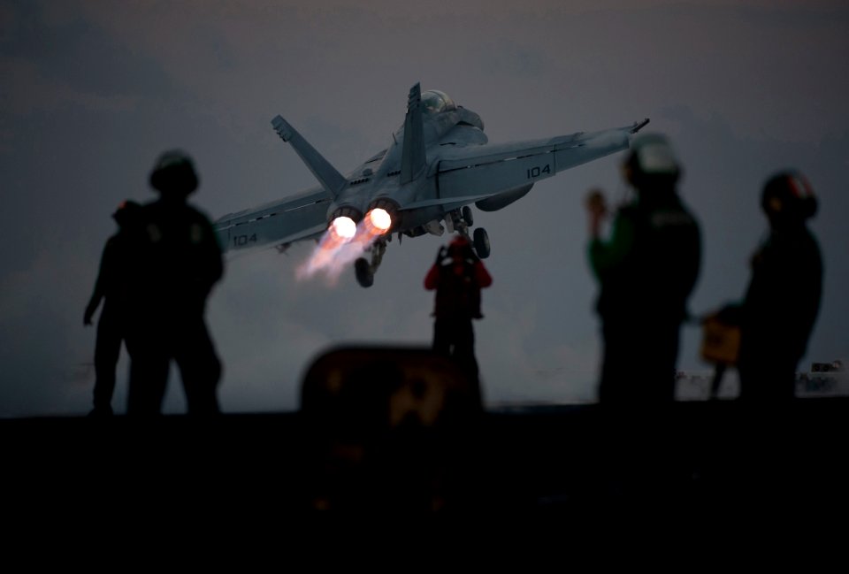 Defense.gov News Photo 111221-N-DR144-375 - An F A-18F Super Hornet assigned to Strike Fighter Squadron 22 launches from the flight deck of the aircraft carrier USS Carl Vinson CVN 70 in the
