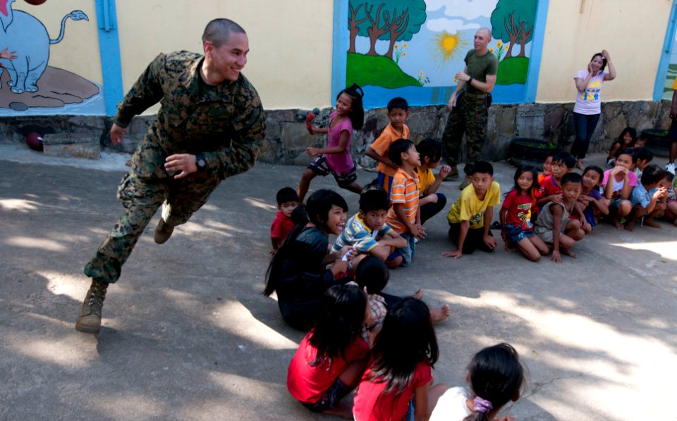 Defense.gov News Photo 111215-N-PB383-274 - Sgt. Marcos Bustos assigned to the 11th Marine Expeditionary Unit embarked aboard the amphibious dock landing ship USS Pearl Harbor LSD 52 plays