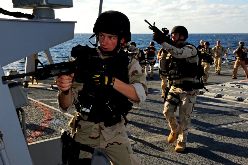 Defense.gov News Photo 120114-N-VH839-010 - Petty Officer 2nd Class Matthew Burger a visit board search and seizure team member aboard the guided-missile destroyer USS Dewey DDG 105