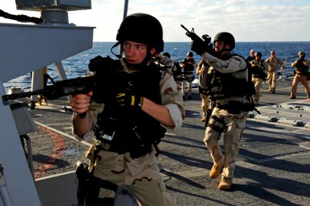 Defense.gov News Photo 120114-N-VH839-010 - Petty Officer 2nd Class Matthew Burger a visit board search and seizure team member aboard the guided-missile destroyer USS Dewey DDG 105