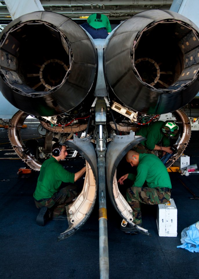 Defense.gov News Photo 120113-N-BT887-277 - Sailors perform maintenance on an F A-18E Super Hornet from Strike Fighter Squadron 14 aboard the aircraft carrier USS John C. Stennis CVN 74 in