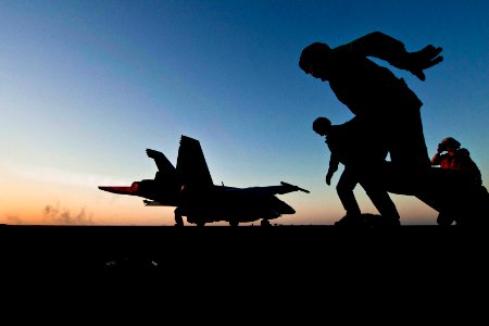Defense.gov News Photo 120118-N-DR144-620 - Flight deck crew members launch an F A-18F Super Hornet from the flight deck aboard the aircraft carrier USS Carl Vinson CVN 70 in the Arabian Sea