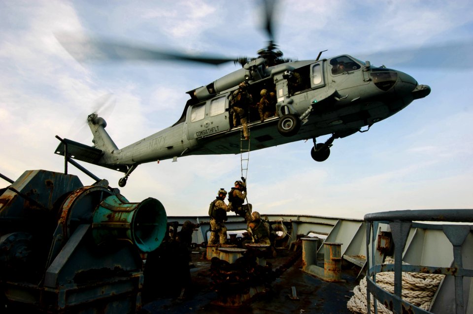 Defense.gov News Photo 120313-N-ZZ999-002 - A U.S. Navy MH-60S Seahawk helicopter attached to Helicopter Sea Combat Squadron 28 conducts a shipboard extraction from an Italian Navy training