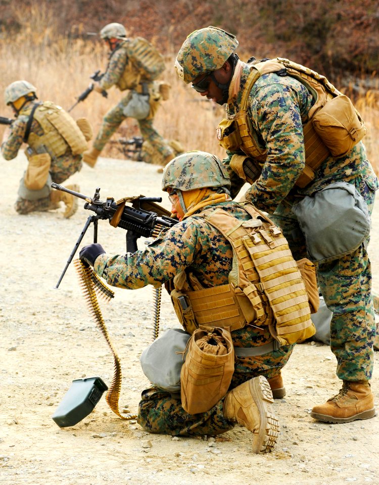 Defense.gov News Photo 120304-N-SD300-124 - U.S. Marine Corps Sgt. Wendell Claxon assigned to 2nd Platoon Fleet Antiterrorism Security Team Company Pacific instructs Lance Cpl. Rudy Pineda