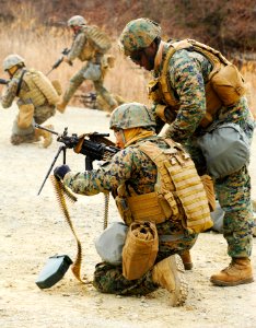 Defense.gov News Photo 120304-N-SD300-124 - U.S. Marine Corps Sgt. Wendell Claxon assigned to 2nd Platoon Fleet Antiterrorism Security Team Company Pacific instructs Lance Cpl. Rudy Pineda