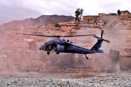 Defense.gov News Photo 120307-N-BV659-443 - A UH-60 Black Hawk helicopter lands to medically evacuate an Afghan commando injured by insurgent small arms fire in the Sar Kani district of