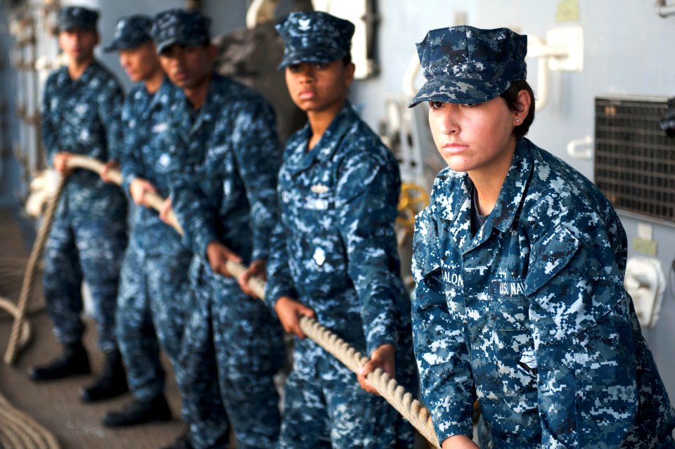 Defense.gov News Photo 120613-N-KS651-301 - Sailors handle a mooring line aboard the USS Pearl Harbor LSD 52 as the ship moors to a pier in Pearl Harbor Hawaii on June 13 2012. The