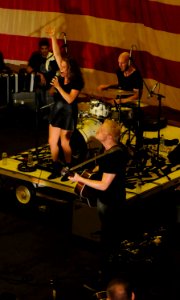 Delta Rae performs aboard USS Bataan 140725-N-HQ940-451