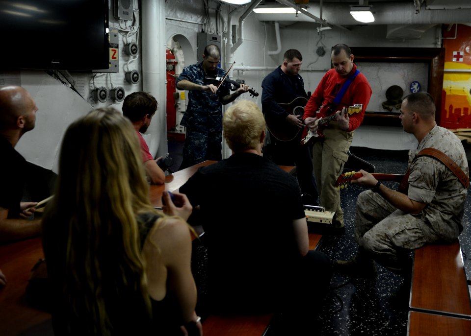 Delta Rae performs aboard USS Bataan 140726-N-YC845-114