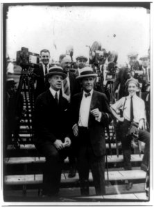 Dempsey-Carpentier boxing match at Boyle's Thirty Acres, Jersey City, N.J.- Tex Rickard standing on right of another man in front of photographers LCCN2002718089