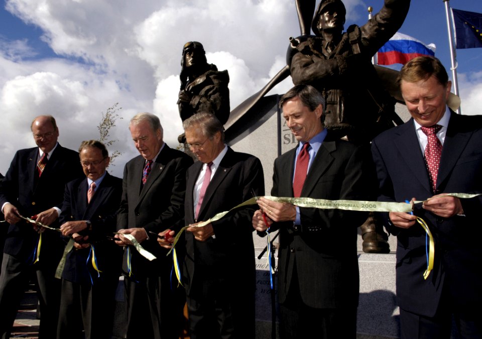 Dignitaries cut the ribbon dedicating the memorial to the Alaska-Siberia Lend Lease Program in Fairbanks
