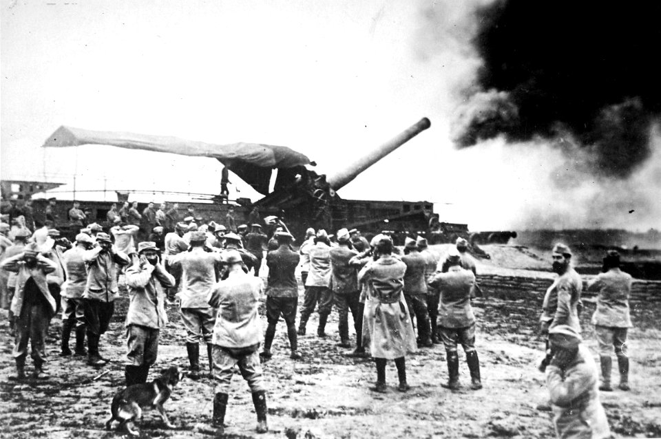 Discharge of a huge French cannon caught by the camera just as the projectile left for the German lines. The gunners