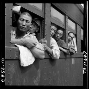 Discharged Japanese soldiers crowd trains as they take advantage of free transportation to their homes after end of... - NARA - 520938
