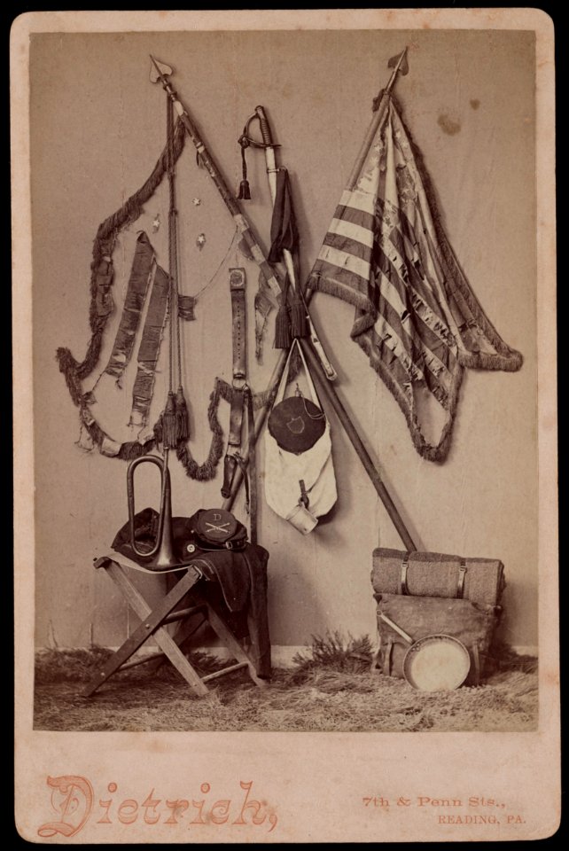 Display of Civil War relics, including tattered flags, sword, canteen, and bugle) - Dietrich, 7th & Penn Sts., Reading, Pa. ; Art studio of W.H. Dietrich, cor. Seventh and Penn Sts., LCCN2017658725