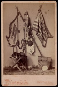 Display of Civil War relics, including tattered flags, sword, canteen, and bugle) - Dietrich, 7th & Penn Sts., Reading, Pa. ; Art studio of W.H. Dietrich, cor. Seventh and Penn Sts., LCCN2017658725