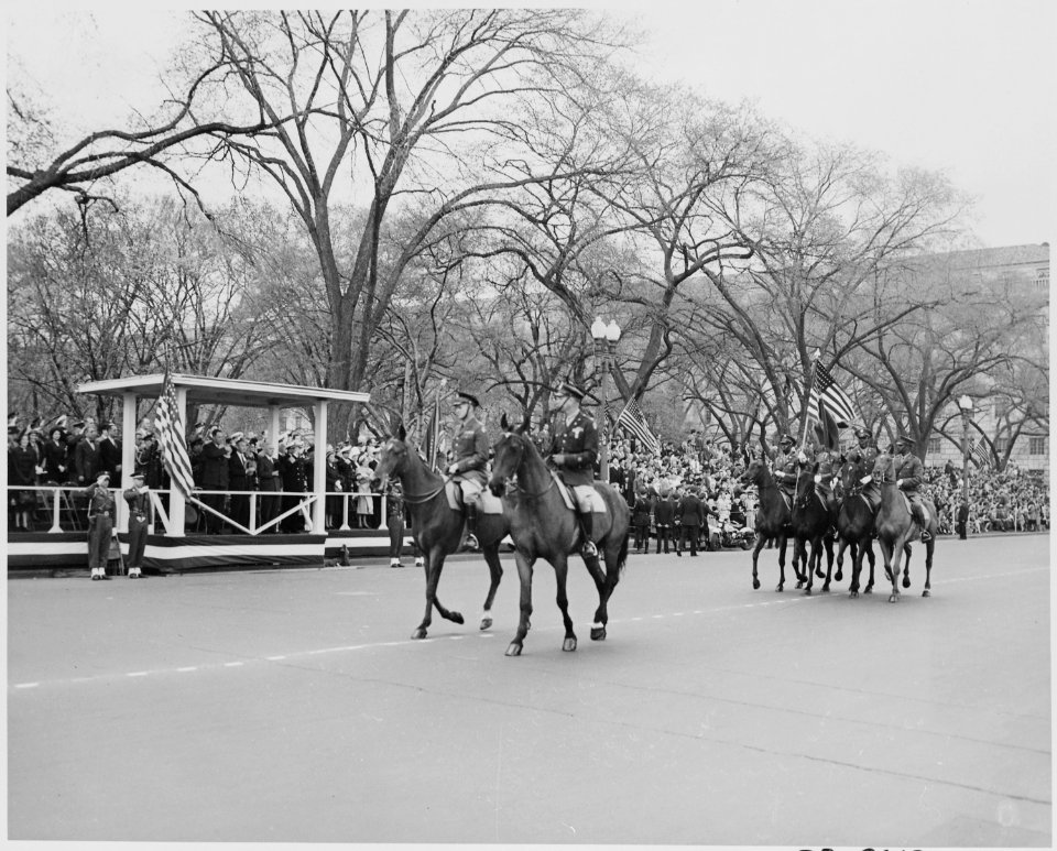 Distance view of President Truman in the reviewing stand watching the Army Day parade in Washington, D. C. - NARA - 199771