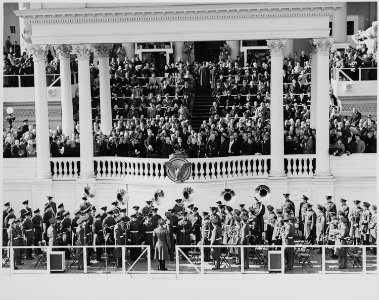 Distance view of the inauguration of President Truman showing the President being sworn into office. - NARA - 199981 photo