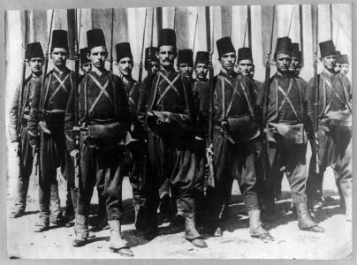 18 Turkish soldiers posed, standing, with rifles LCCN2002708819