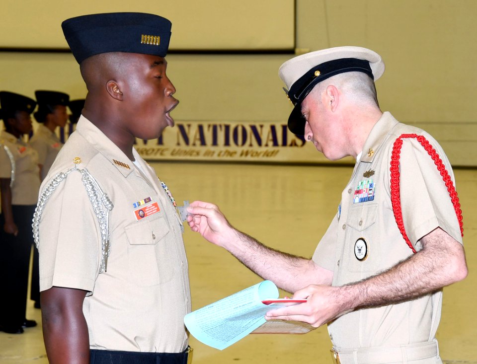 180406-N-IK959-150 - NJROTC captain gets inspected by SCPO Shaun Thompson, USN