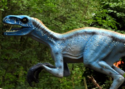 Prehistoric raptor green dinosaur